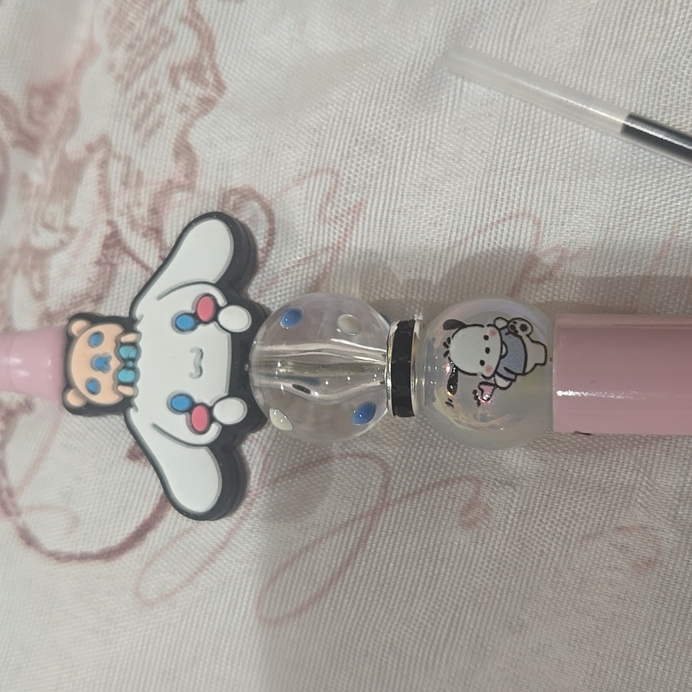 Cute Pink Pen with Sanrio Character. Includes Extra Ink